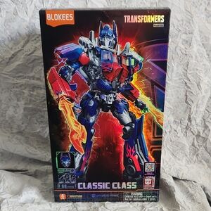 Champion Optimus Prime Figure – Red, Blue, Purple